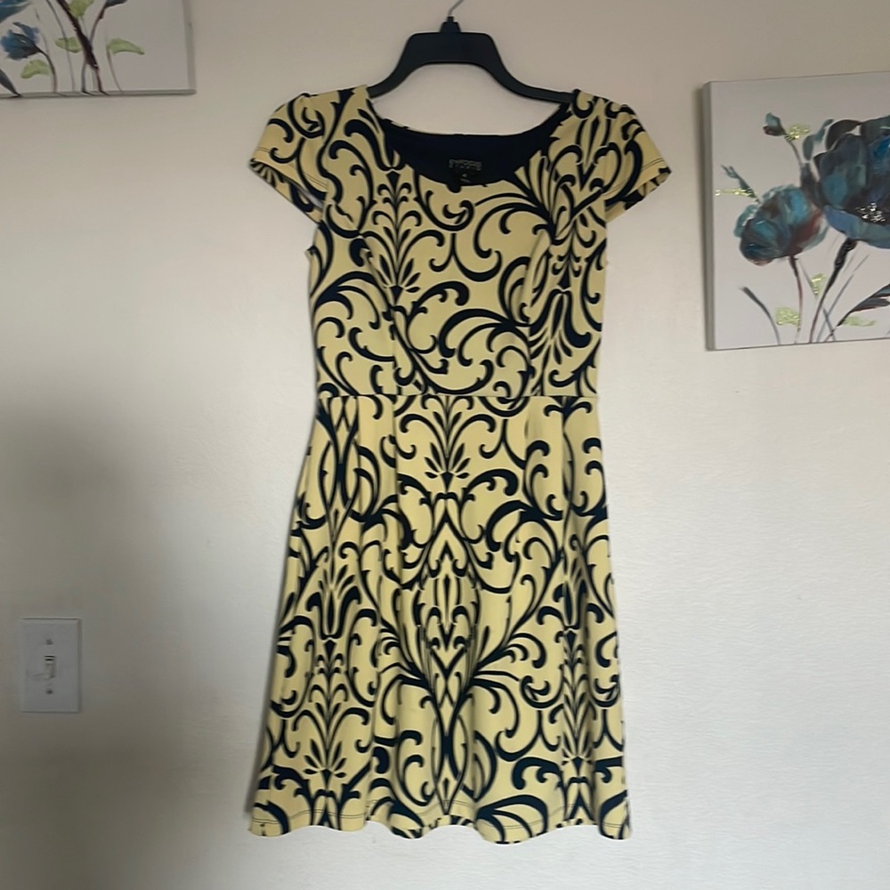W focus studio fit and flare dress with cap sleeve.